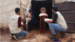 Bread Distribution to Children in Refugee Camps